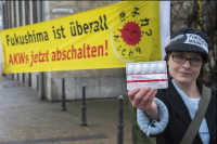 "Fukushima is everywhere, switch nuclear power stations off now," says the banner