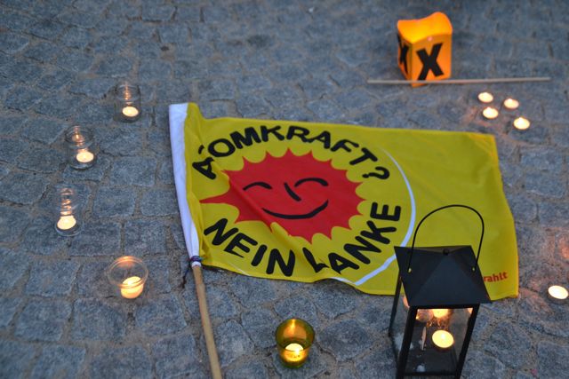 Flag and lanterns on ground