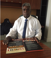 Yingiya Mark Guluya MLA, Member for Nhulunbuy presenting the Yolngu Nations letterstick about teaty and sovereignty to parliament on 18 October.