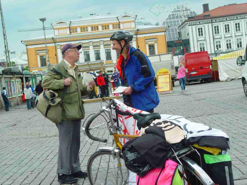 Distributing flyers to passers-by