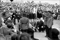 Three INLA members died in the republican hunger strikes in the Maze Prison in the early 1980s. In this picture, gunmen fire shots above the coffin of hunger striker Patsy O`Hara in may 1981.