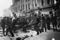 British policemen dismantle a barrier during a British union march