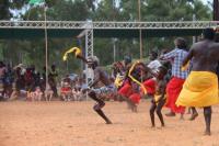 Men, women, children dancing together